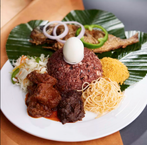 48oz Bowl of Waakye, Meat, Tender Cow Skin, Fried Fish, Egg, Fried Sweet Plantain, Spaghetti, Stewed Gari, Shito, & Salad